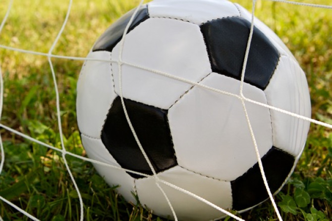 soccer-ball-in-the-goal-net-xs.jpg