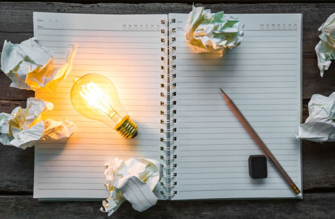 top-view-lit-light-bulb-notebook.jpg