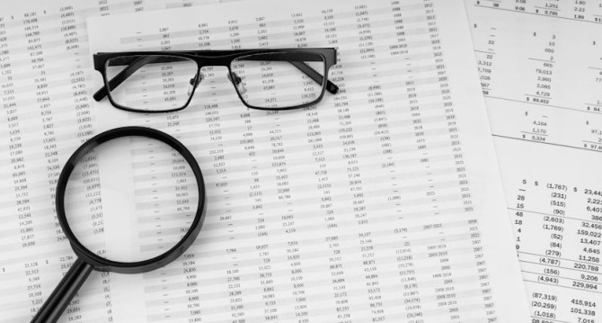 magnifying-glass-eye-glasses-financial-statement.jpg