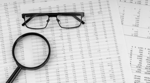 magnifying-glass-eye-glasses-financial-statement.jpg